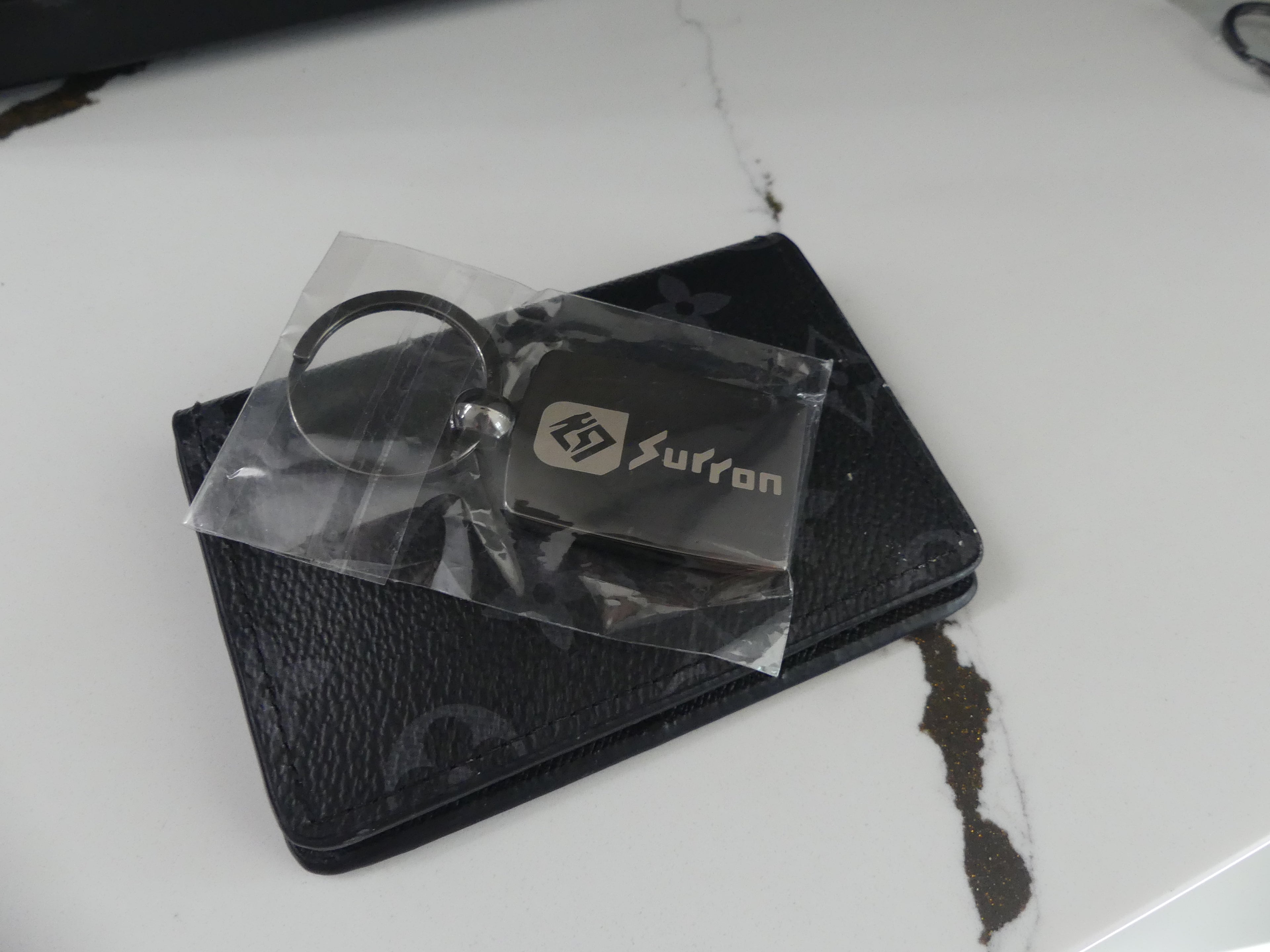 Carbon Fiber Surron Keychain