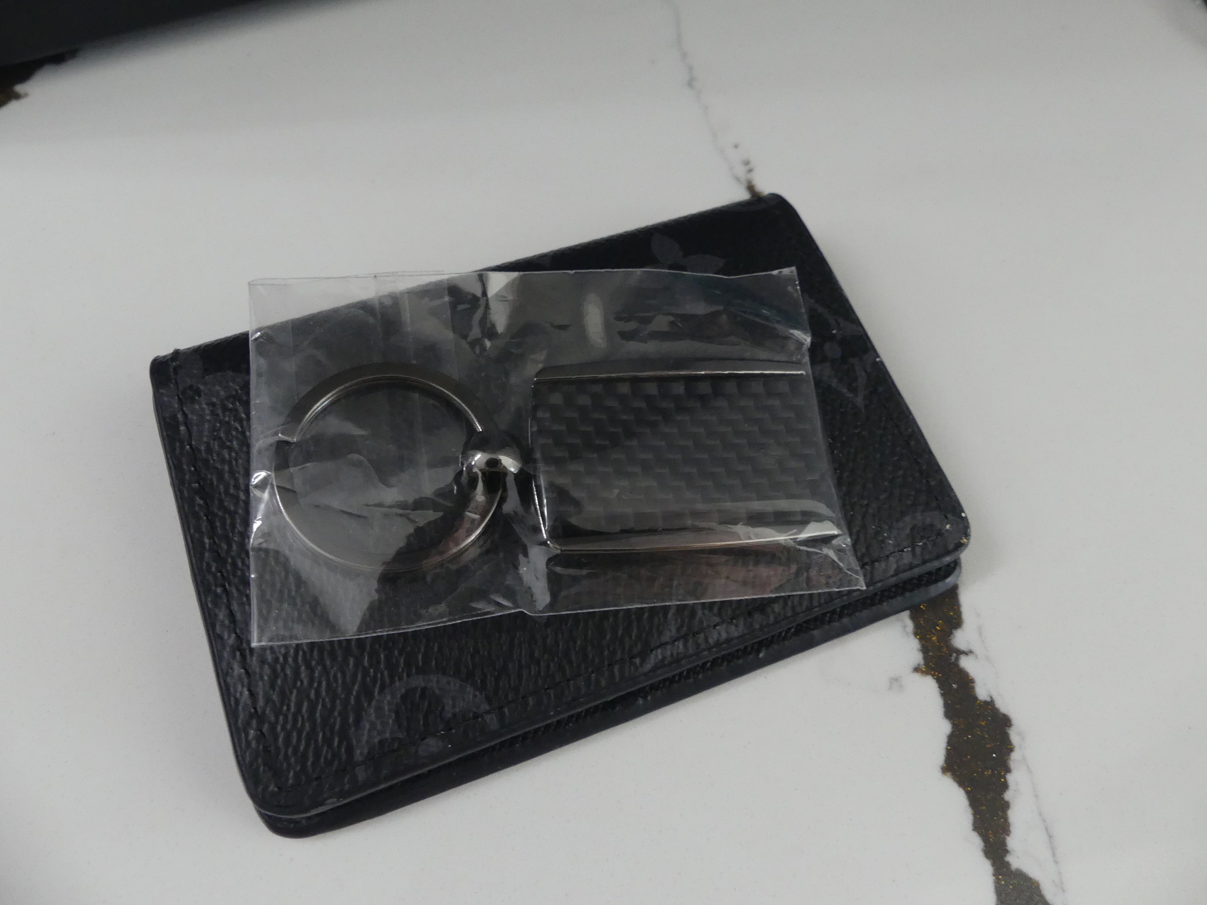 Carbon Fiber Surron Keychain
