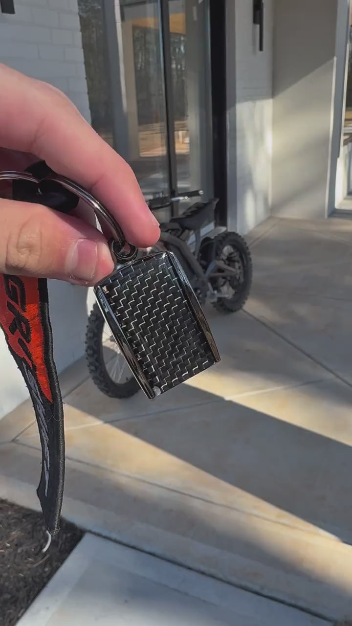 Carbon Fiber Surron Keychain